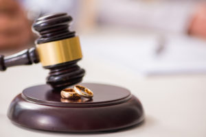 When to Hire a Divorce Lawyer - Judge gavel deciding on marriage divorce